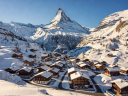 Zermatt village overview beneath the iconic sharp peak of the Matterhorn